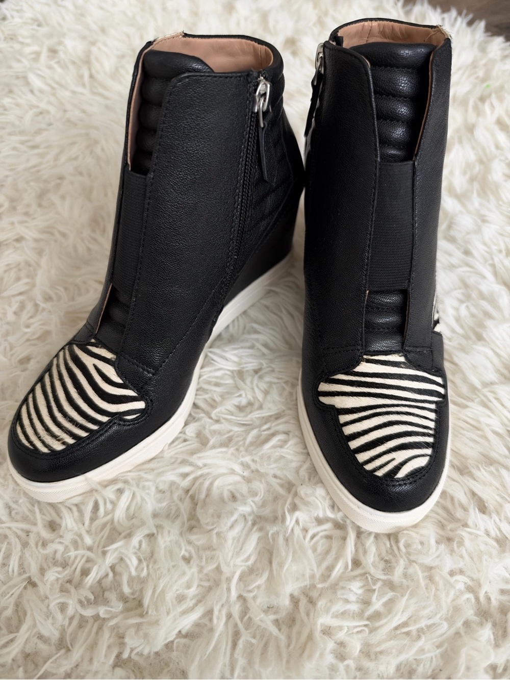 Black High-Top Wedge Sneakers with Zebra Accent